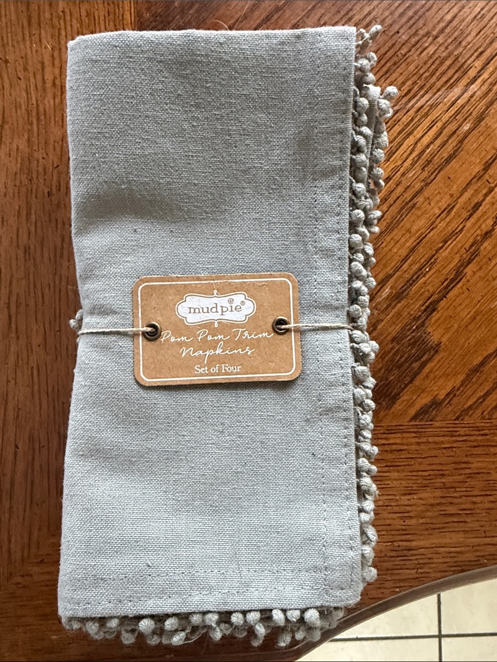 Mud Pie Pom Pom Trim Napkins in Light Gray